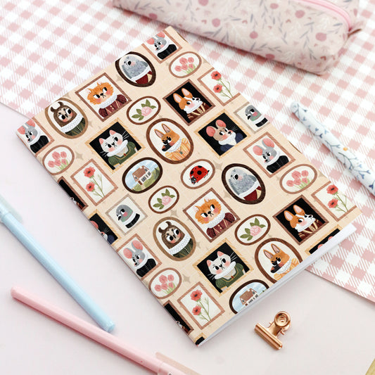 cute notebook decorated with animals wearing ruffled collars
