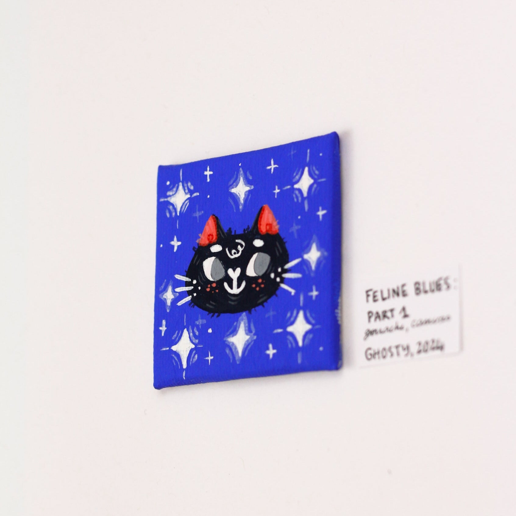 tiny gouache painting of a black cat