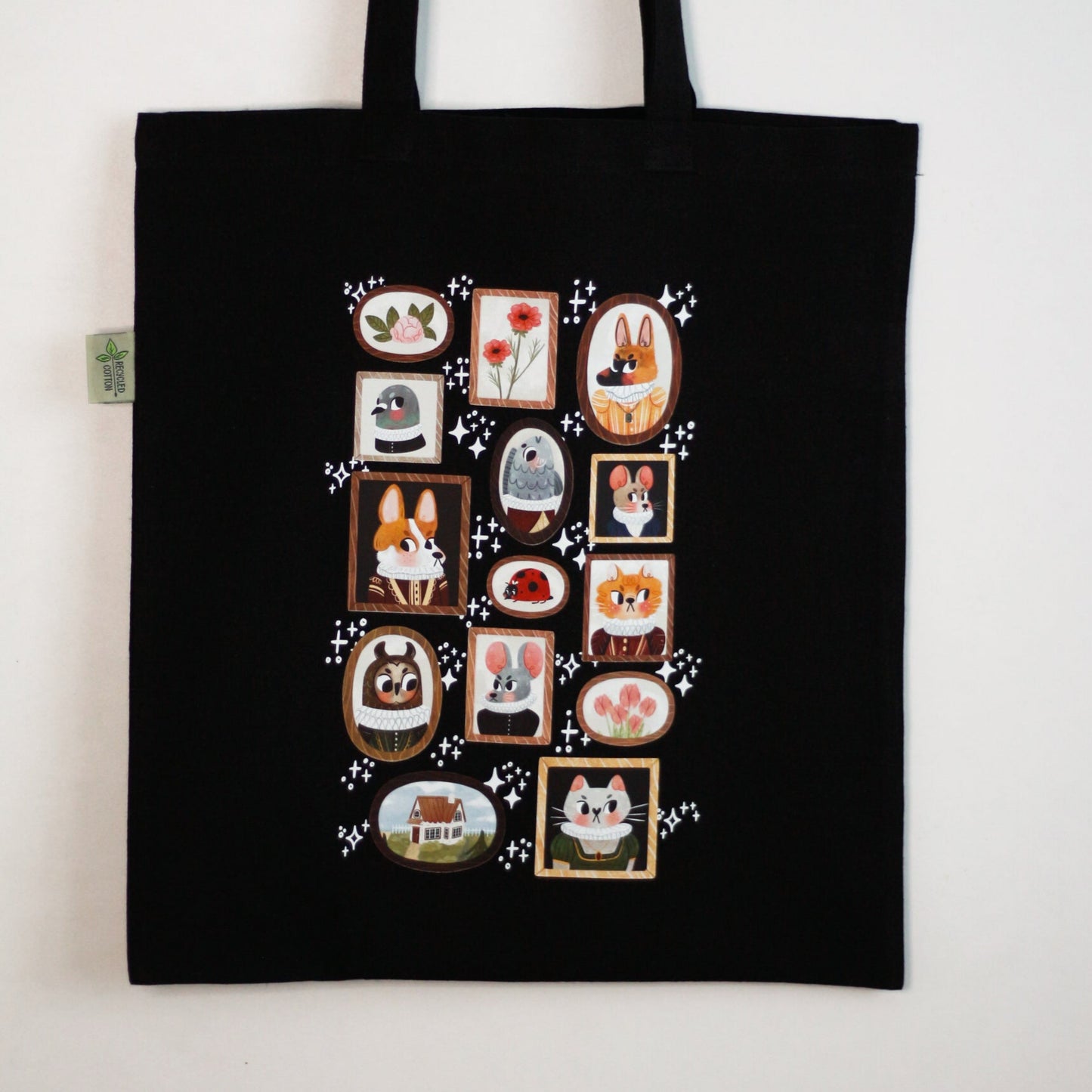 eco friendly tote bag with tiny frames of animals wearing ruffled collars, flowers, cottagecore