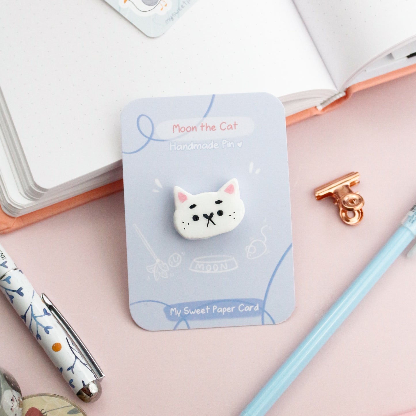 white cat pin