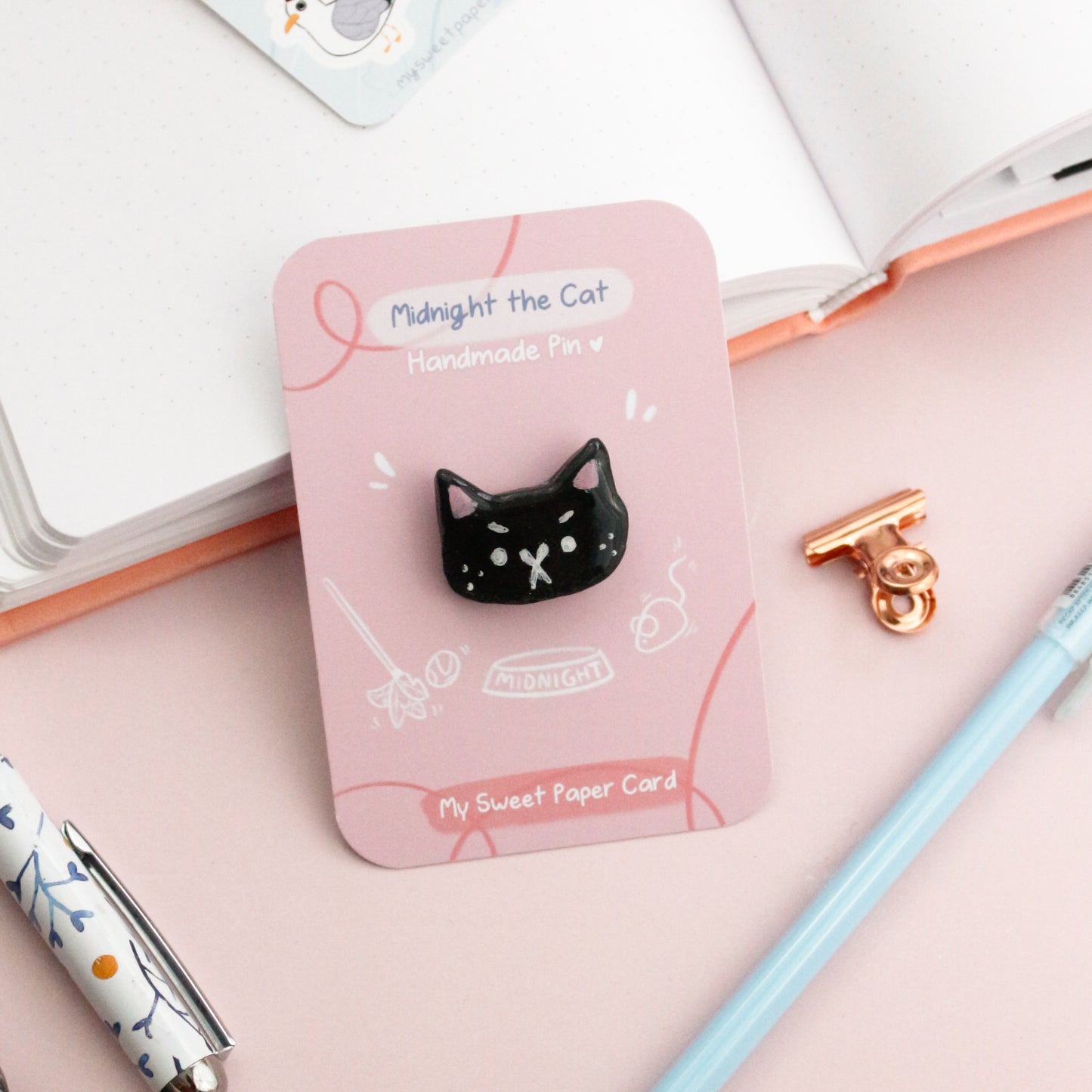 angry black cat pin
