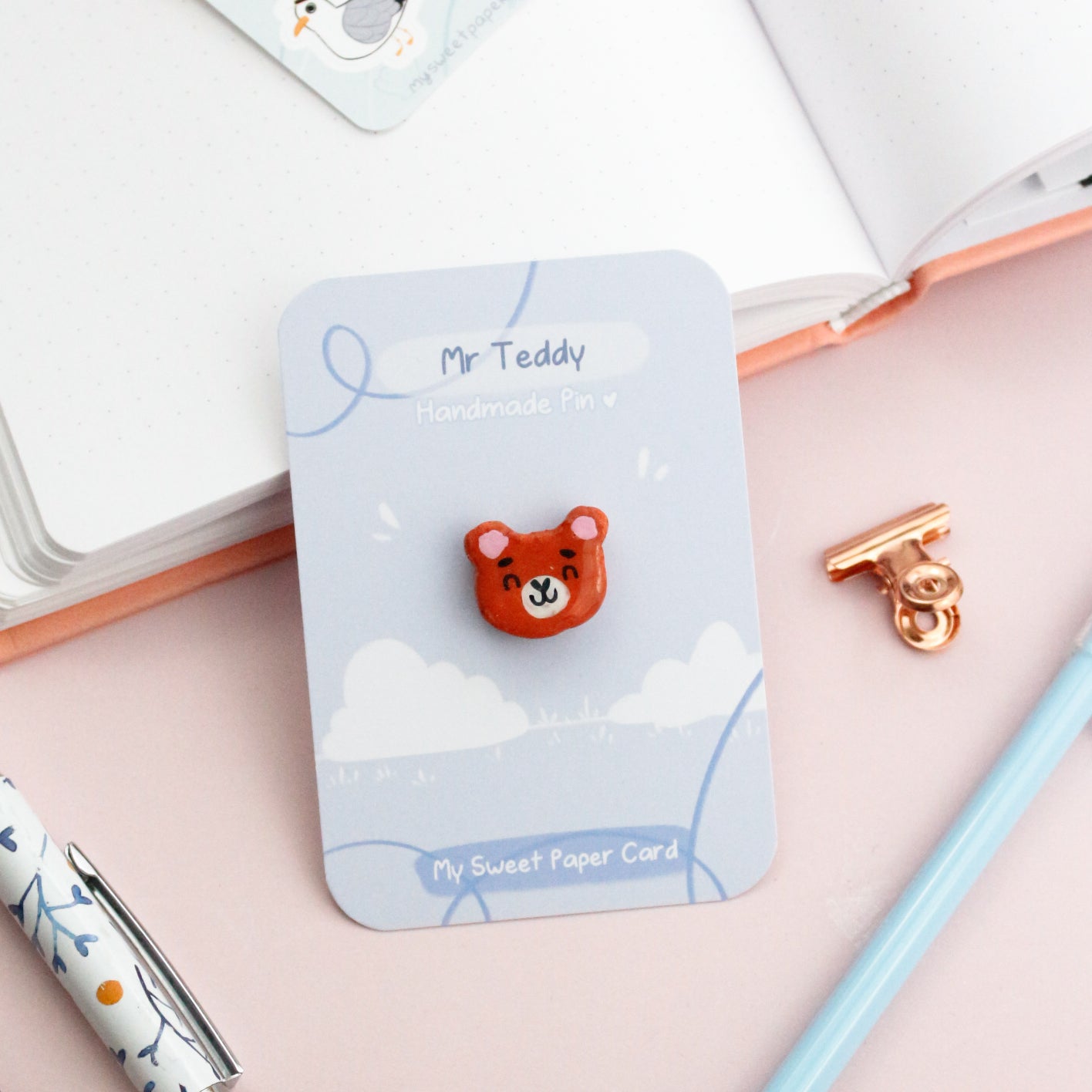 happy teddy bear pin