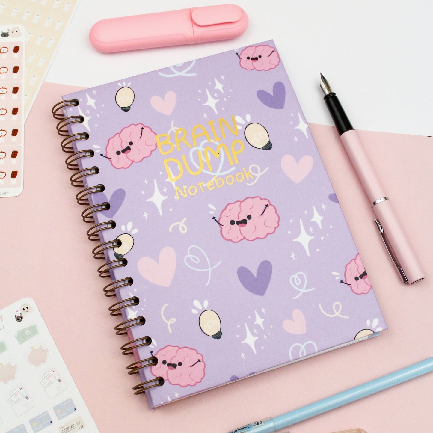 kawaii notebook with purple covers and cute brains